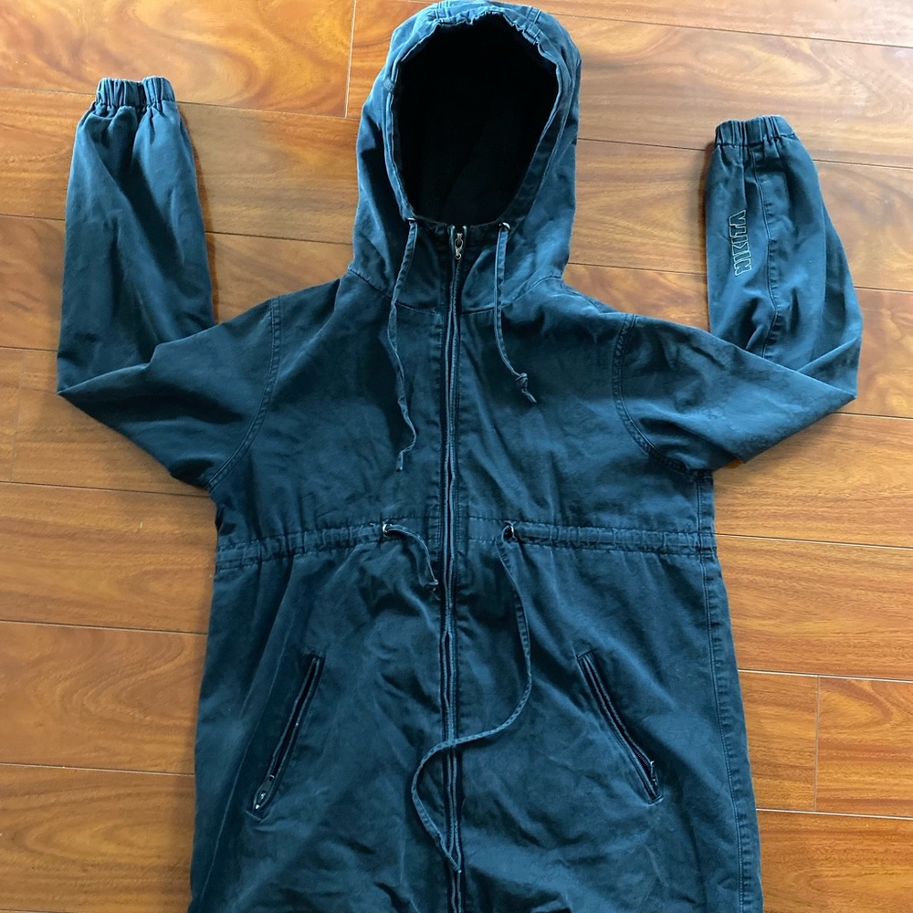 Nikita black jacket, size XS. Black with light black print